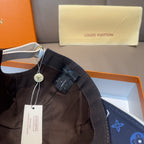 Louis Vuitton cap with adjustable strap and hang tag, navy monogram fabric