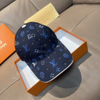 Louis Vuitton cap in dark navy with blue and white logo monogram pattern, curved brim