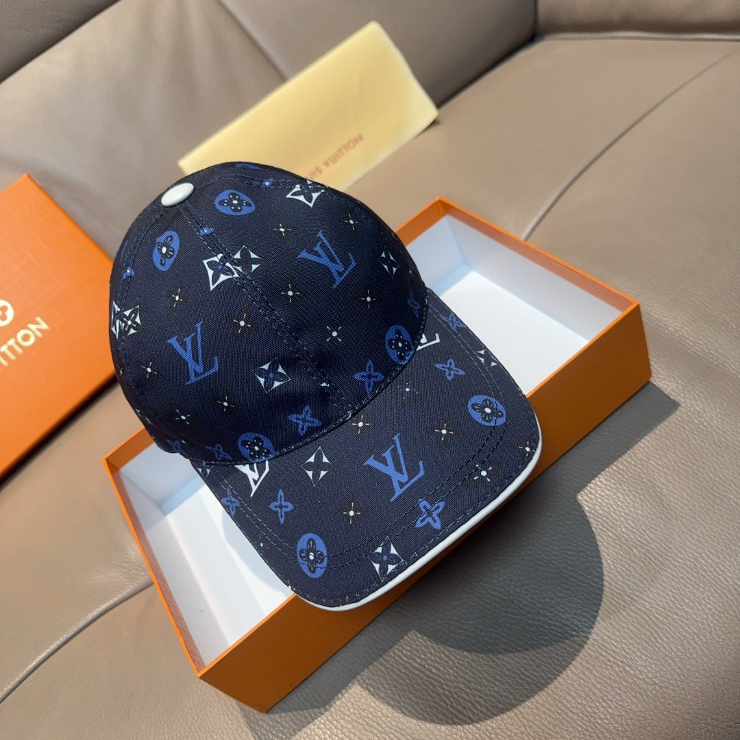 Louis Vuitton cap in dark navy with blue and white logo monogram pattern, curved brim