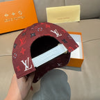 Louis Vuitton cap crown with open front and inner label, dark red monogram.