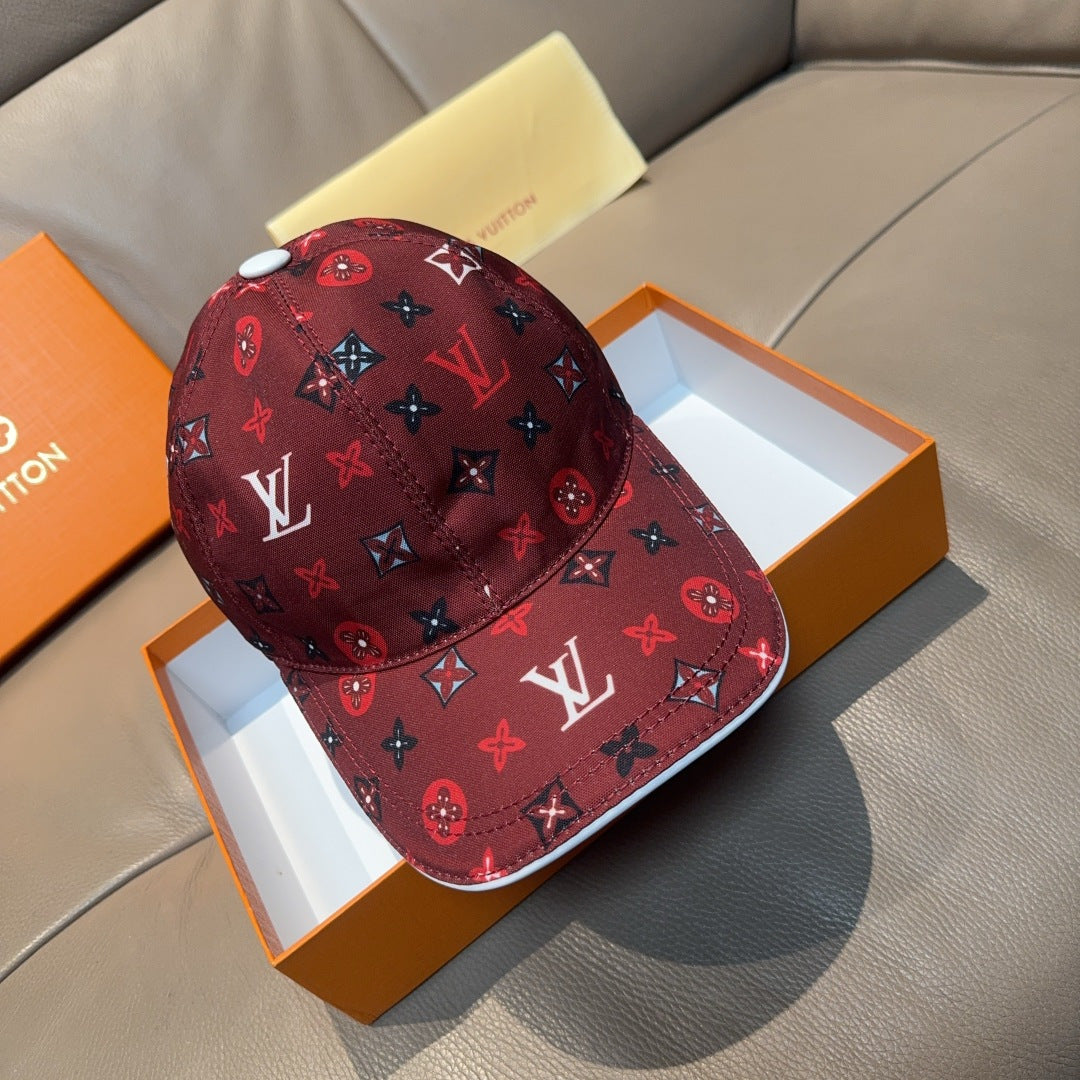 Louis Vuitton cap, dark red monogram print, curved brim.