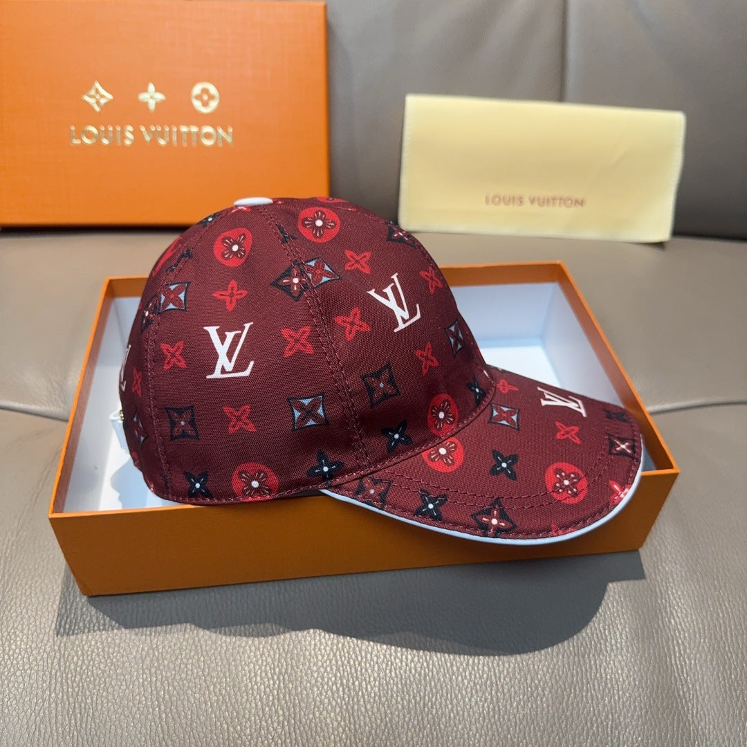Louis Vuitton cap, dark red monogram print, front angle with curved brim.