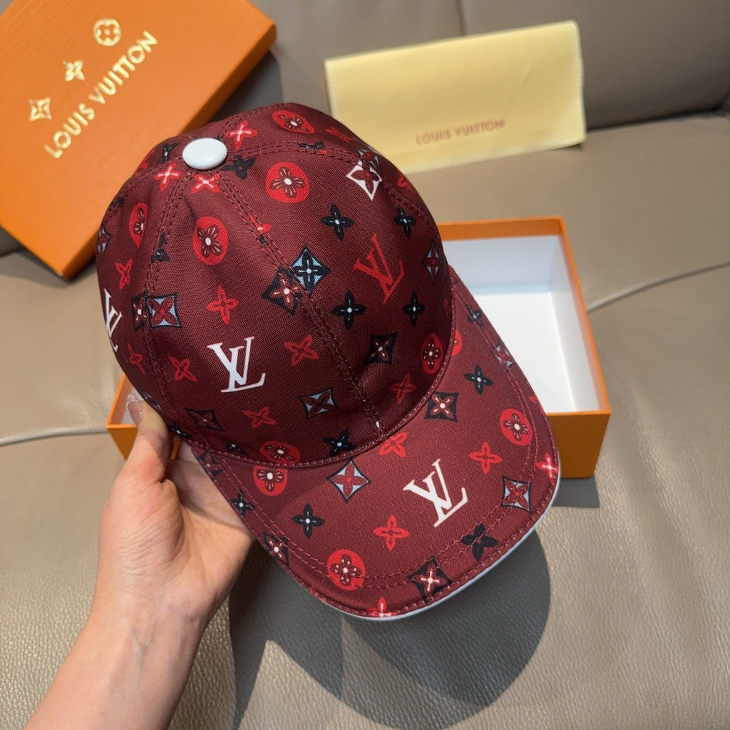 Louis Vuitton cap, dark red monogram print, front panel with round white button.