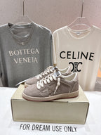 Golden Goose gray low-top sneakers with white laces and side panel details
