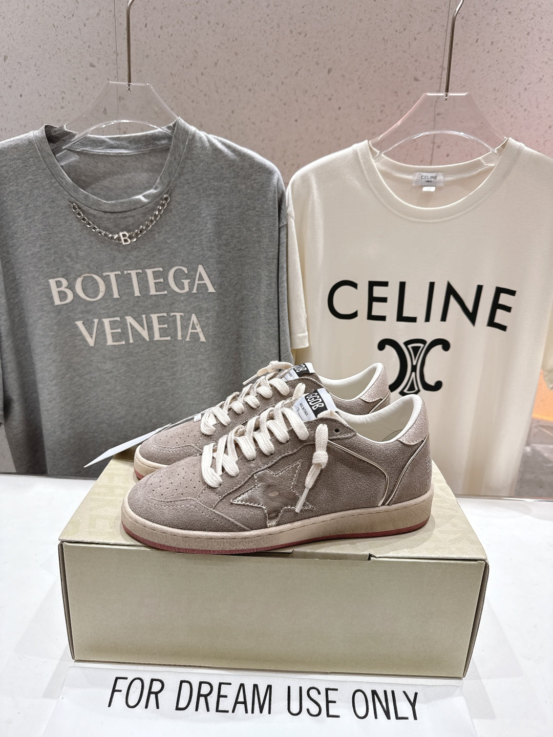 Golden Goose gray low-top sneakers with white laces and side panel details