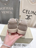 Golden Goose gray low-top sneakers with textured heel back detail