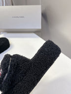 Balenciaga black fuzzy slide sandals close-up of toe strap and zipper