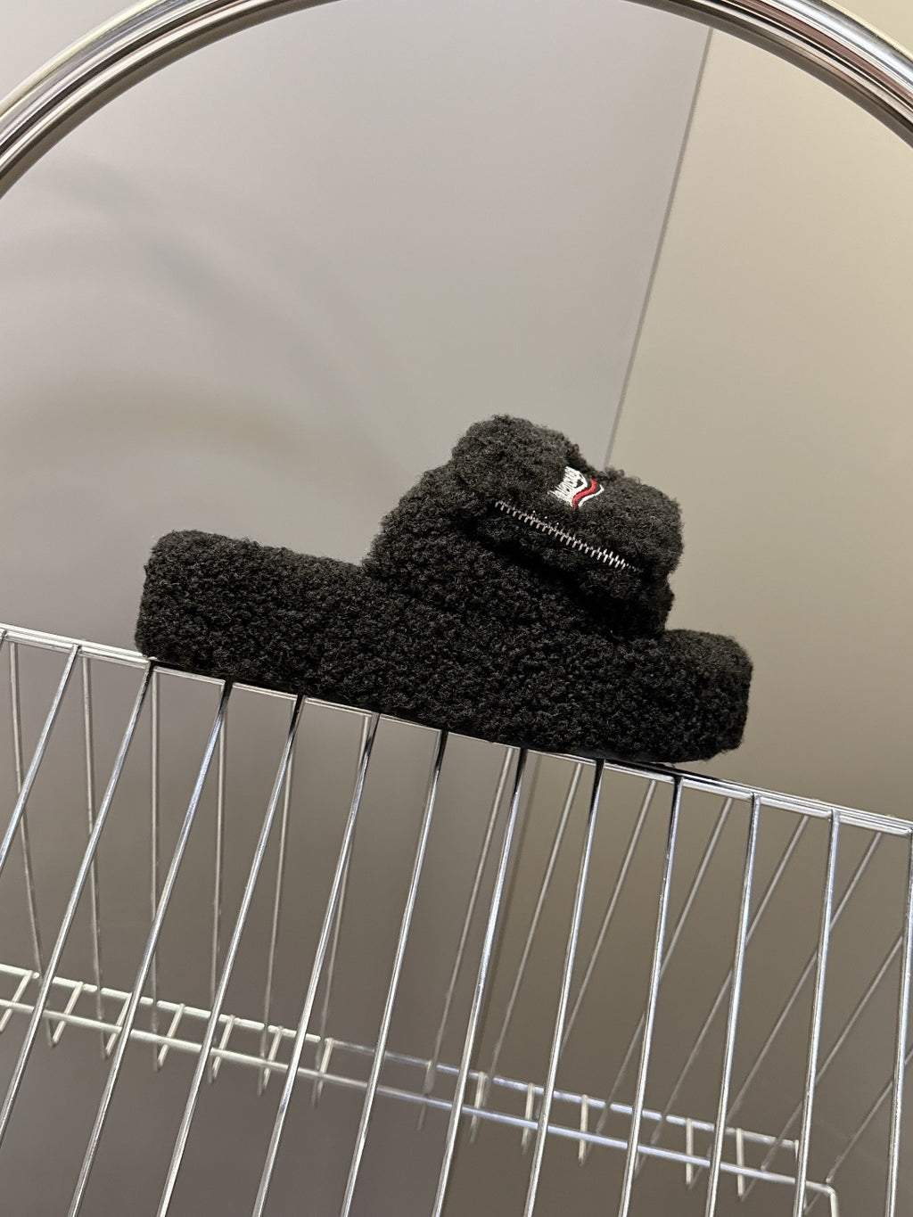 Balenciaga black fuzzy slide sandal with top logo patch and zipper