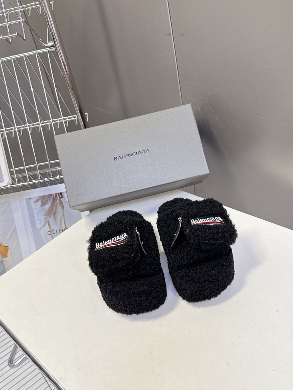 Balenciaga black fuzzy slide sandals with embroidered logo strap