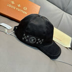 Black Louis Vuitton baseball cap with logo monogram band on front