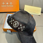 Black Louis Vuitton baseball cap with front LV logo emblem on monogram band