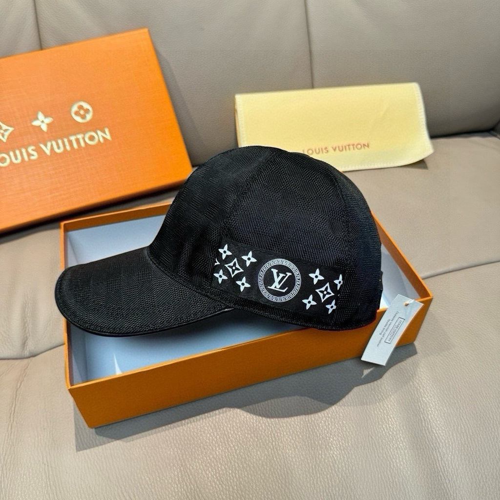 Black Louis Vuitton baseball cap with central monogram star logo patch on crown