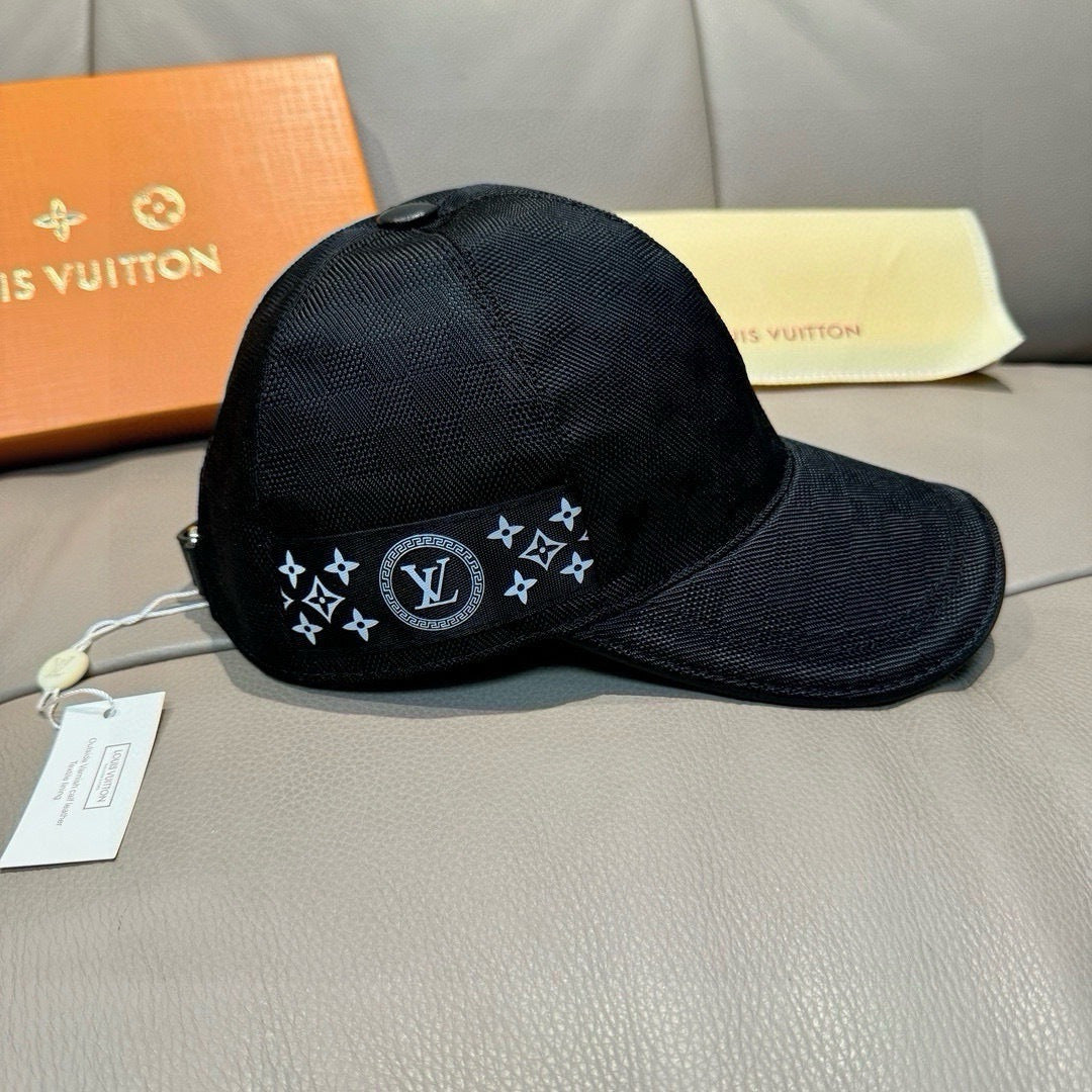 Black Louis Vuitton baseball cap with monogram star logo patch on front brim