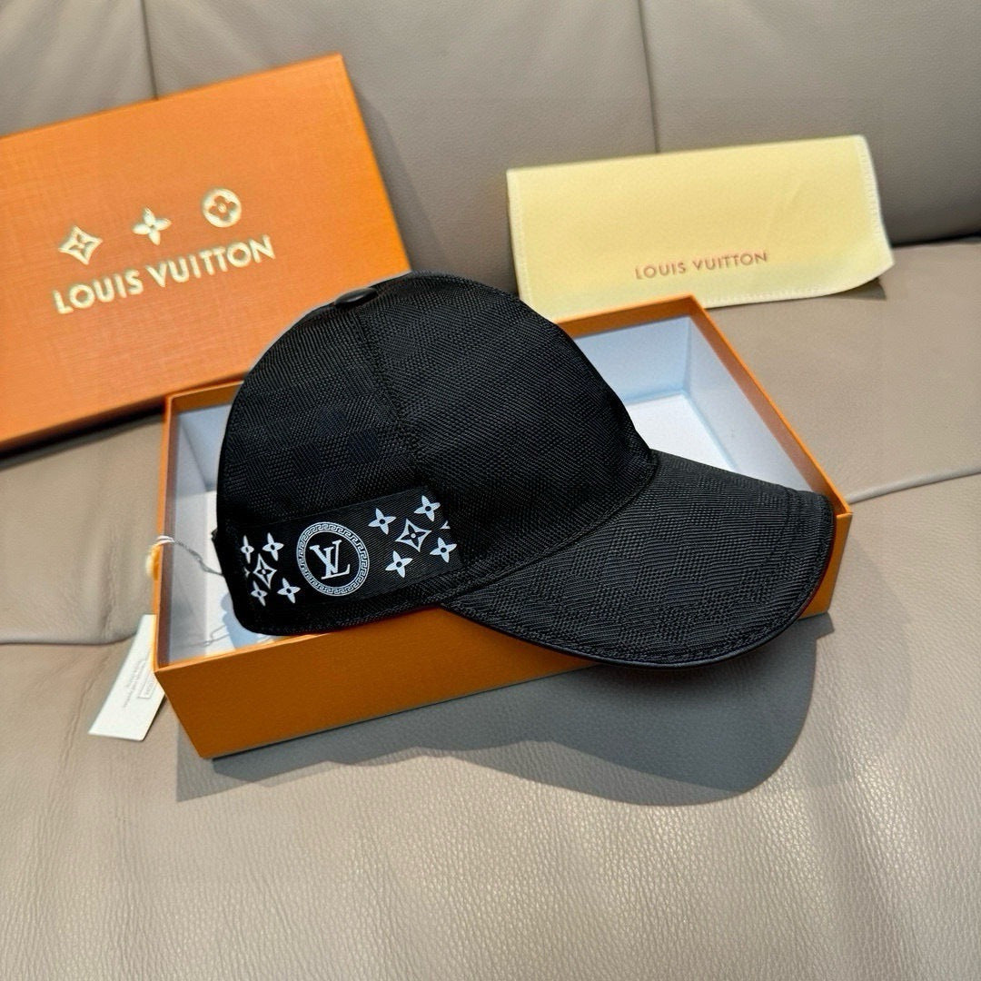 Black Louis Vuitton cap with monogram star emblem across front panel and curved brim
