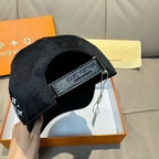Black Louis Vuitton cap interior with adjustable strap and branded leather patch