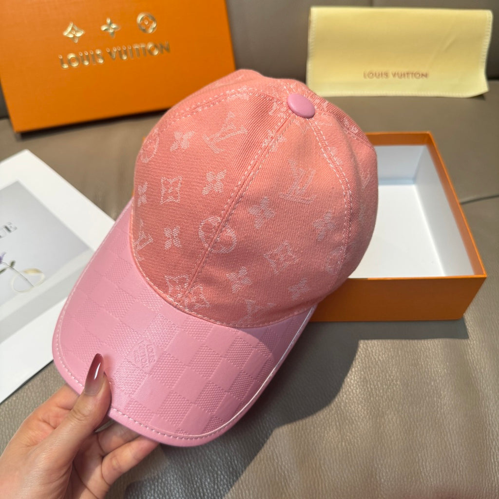 Pink monogram baseball cap with purple top button and stitched checkered brim