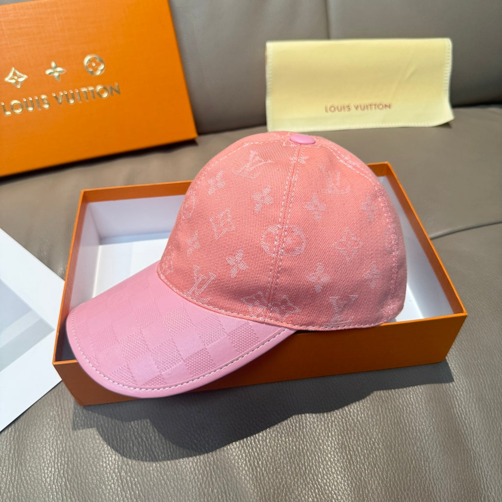 Pink monogram baseball cap with checkered brim and purple button