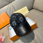 Louis Vuitton monogram baseball cap in dark fabric with black leather brim