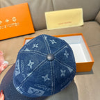 Louis Vuitton denim monogram cap, blue with round top button and stitched monogram blocks