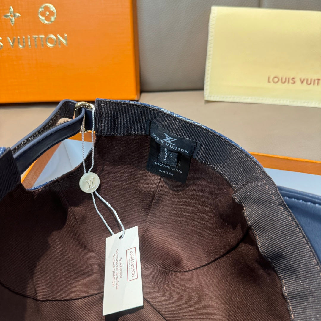 Louis Vuitton cap interior with adjustable strap, brown lining, and hanging price tag