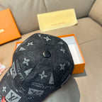 Black monogram baseball cap, top button and LV-style pattern