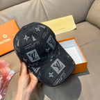 Black monogram baseball cap, side view, LV-style motifs