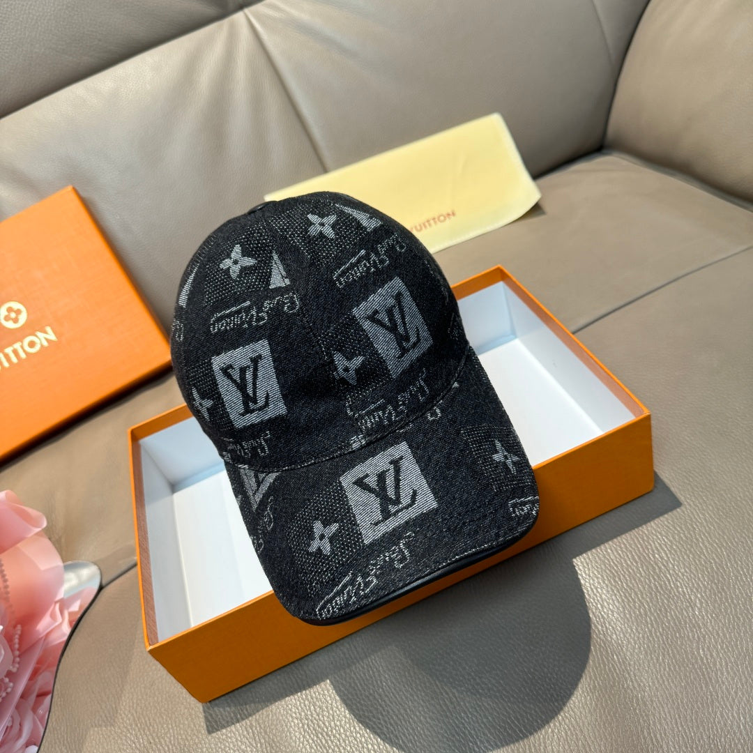 Black monogram baseball cap with scattered LV-style logos