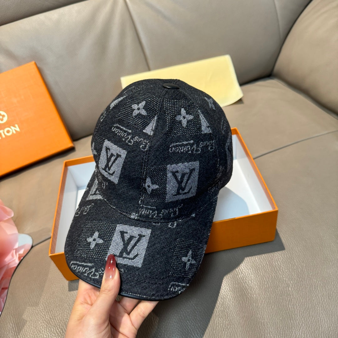 Black monogram baseball cap, front view, LV-style symbols