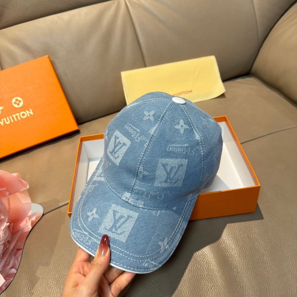 Louis Vuitton blue denim cap with monogram print and round button on top