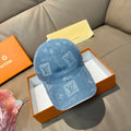 Louis Vuitton blue denim cap with light monogram print, curved brim and stitched panels