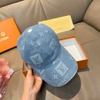 Louis Vuitton blue denim cap with monogram print, side view and curved brim