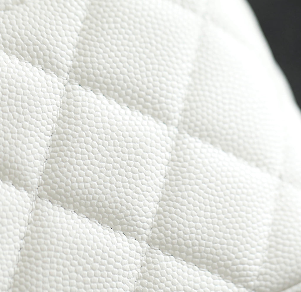 White quilted leather texture detail