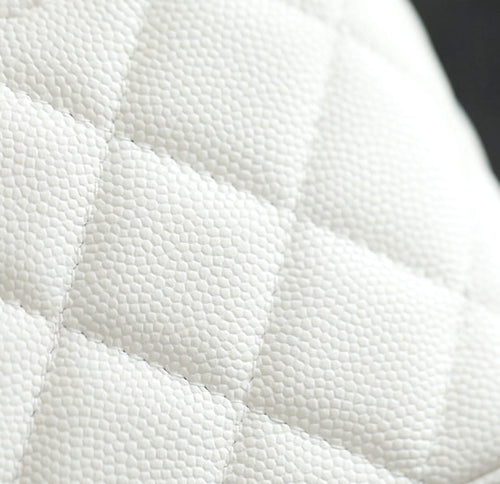 White quilted leather texture detail