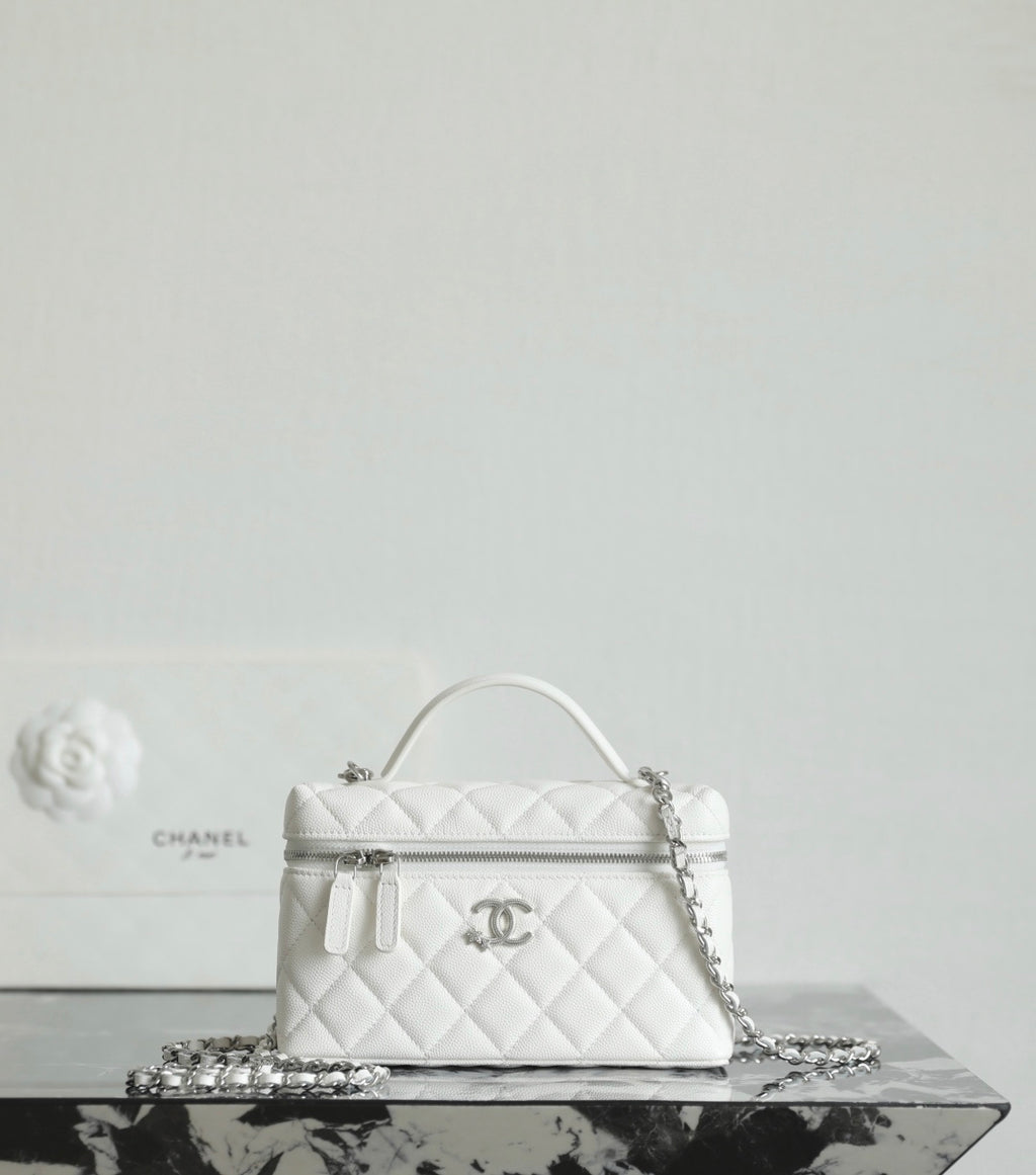 White Chanel mini bag with chain strap and front zip pocket