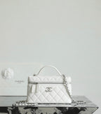 White Chanel mini bag with chain strap and front zip pocket
