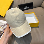 Fendi cap in light cream with embossed logo pattern and curved brim.