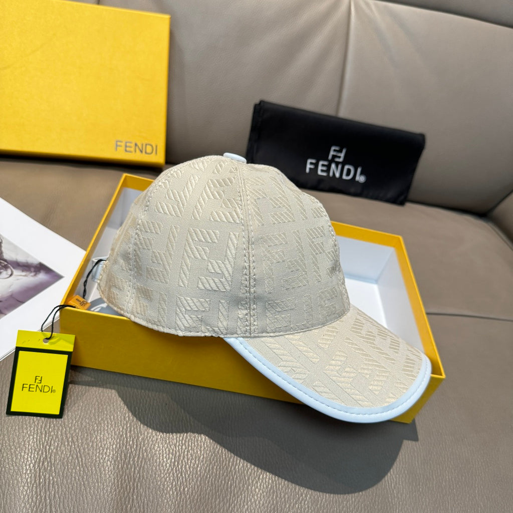 Fendi cap in light cream with textured logo pattern and curved brim.