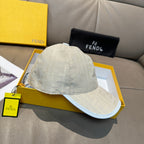 Fendi cap in light cream with textured logo pattern and curved brim.