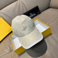 Fendi cap in light cream with allover logo pattern and curved brim.