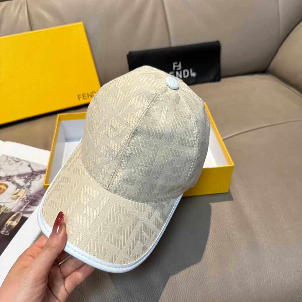 Fendi cap in light cream with allover logo pattern and curved brim.