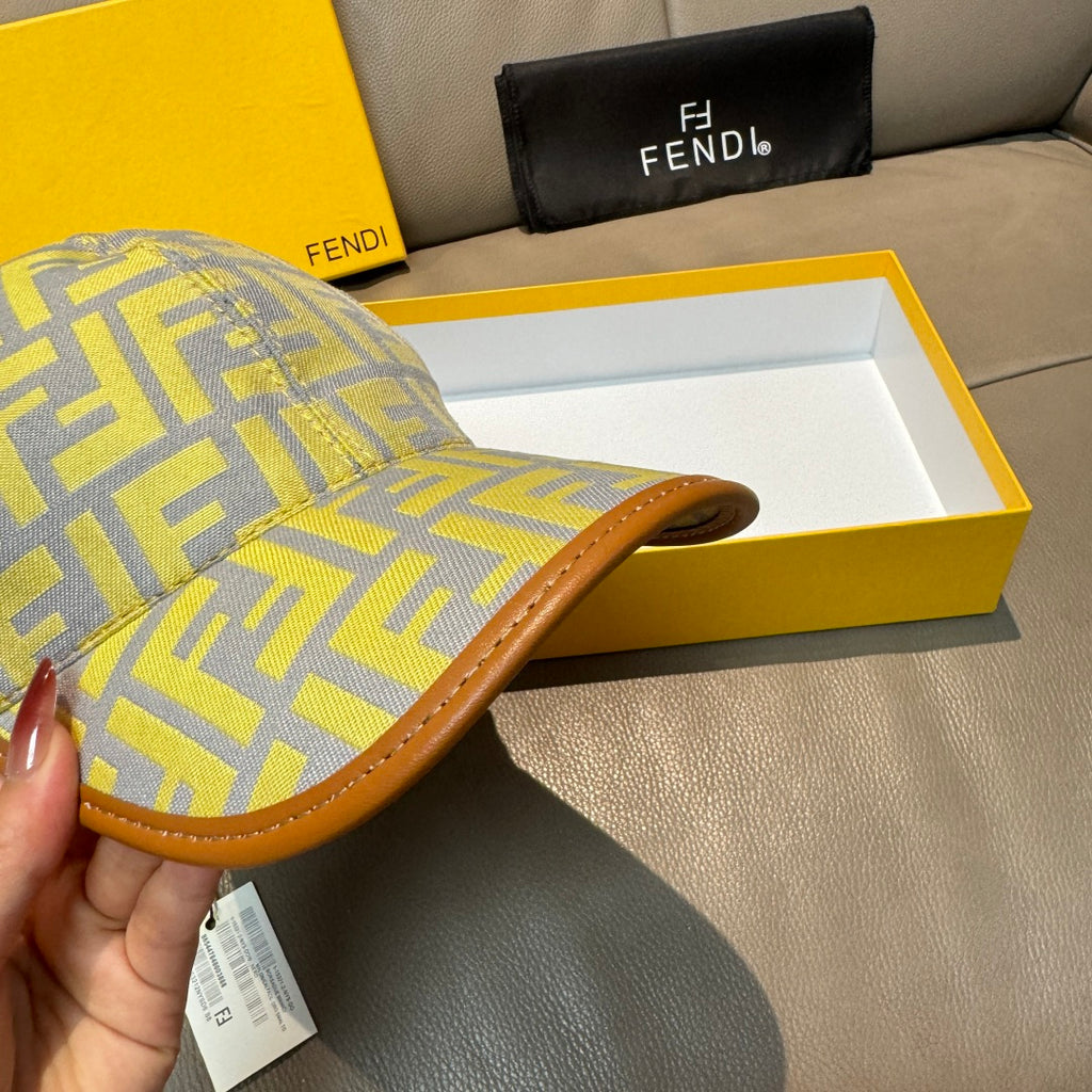 Fendi cap side view in light yellow and blue FF monogram with tan brim
