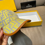 Fendi cap side view in light yellow and blue FF monogram with tan brim