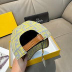 Fendi cap with tan strap detail across opening, yellow and blue FF monogram