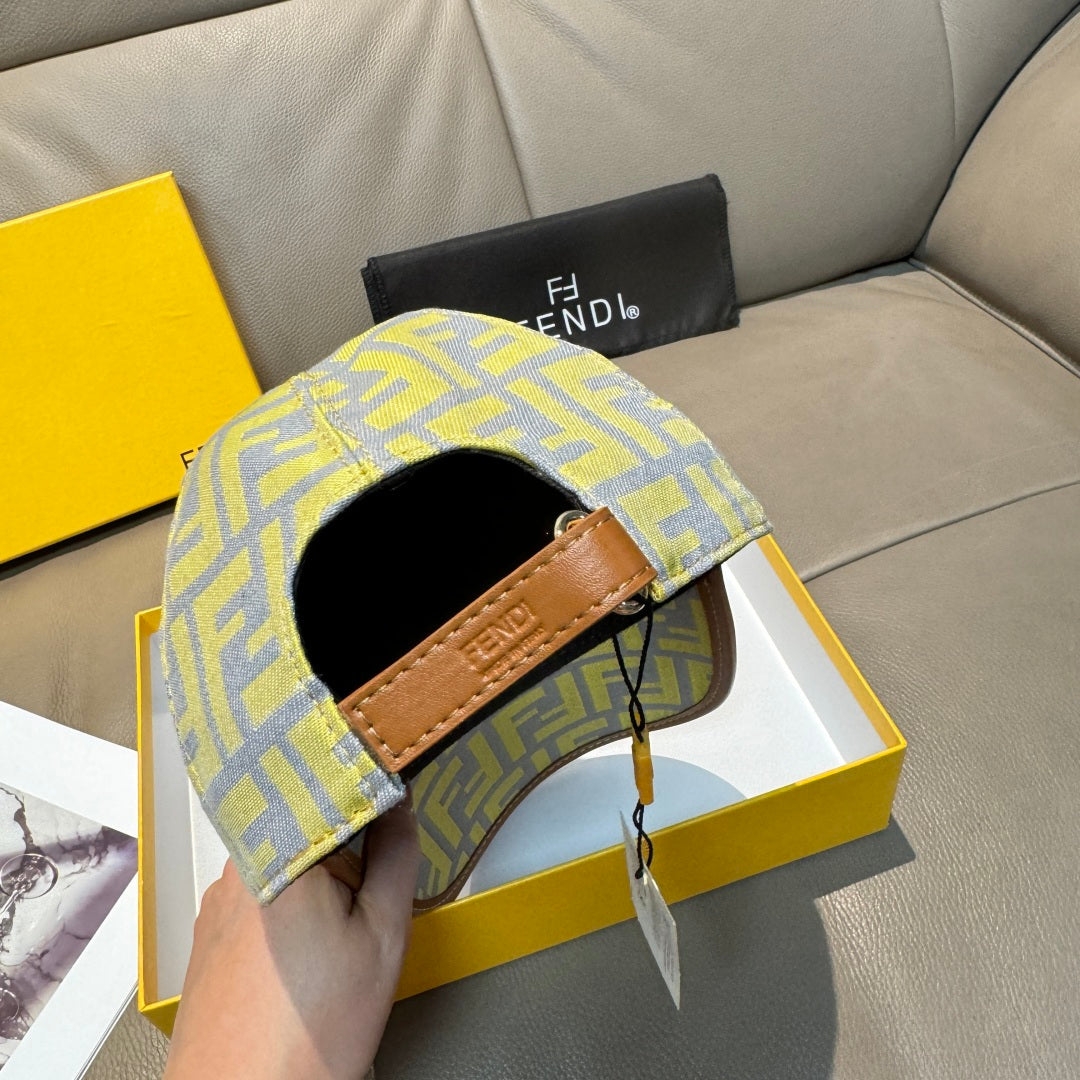 Fendi cap with tan strap detail across opening, yellow and blue FF monogram