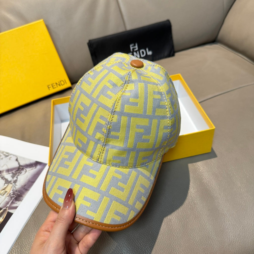 Fendi cap front view in yellow-and-blue FF monogram with tan-brown brim and top button