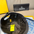 Blue FENDI monogram cap interior view with black lining and tags