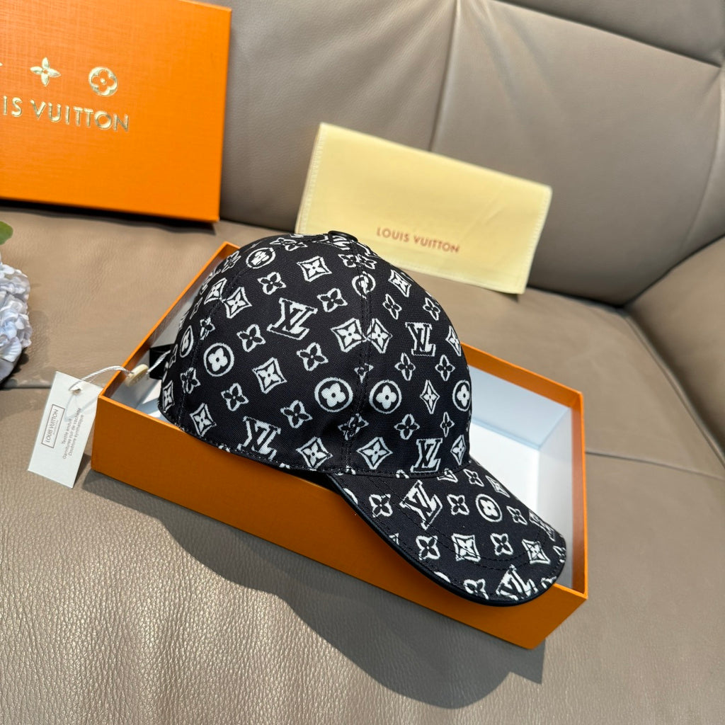 Louis Vuitton cap, black with white monogram print, curved brim and round crown.