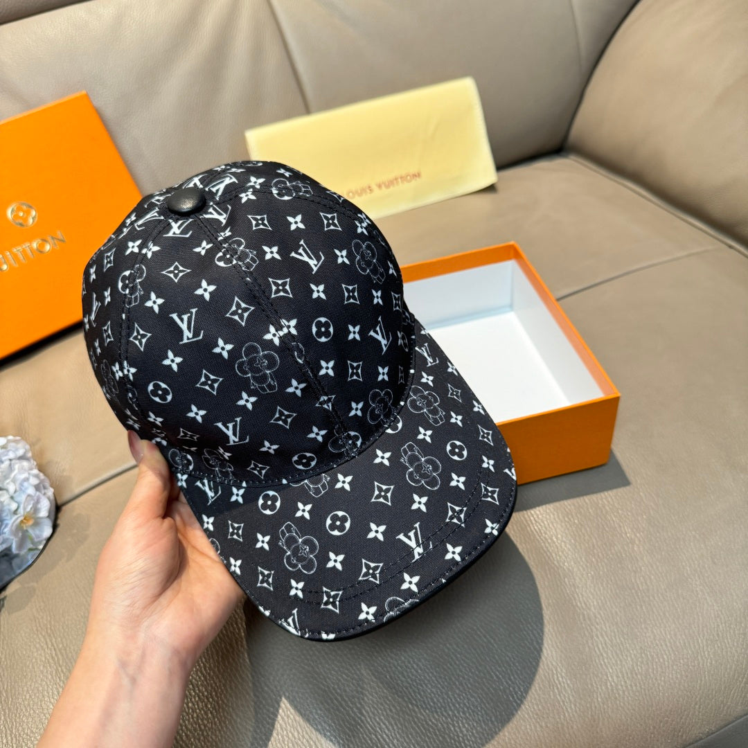 Black baseball cap with white monogram pattern, front and side view