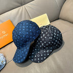 Pair of baseball caps with monogram pattern: dark blue and black with curved brims