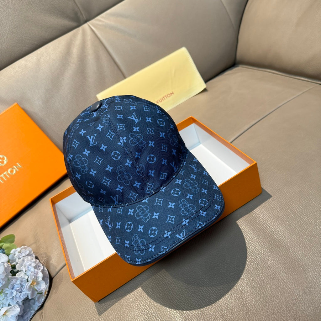 Louis Vuitton monogram baseball cap, blue with repeating logo pattern